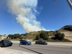 Smoke from Max Fire in Stevenson Ranch, Los Angeles County, California, visible from the road.