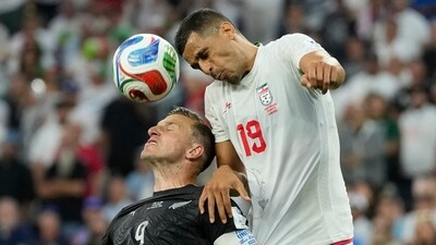 Iran defender Ali Nemati thought he had scored in first-half stoppage time, but his header from a free kick was comfortably offside. (AP Photo)