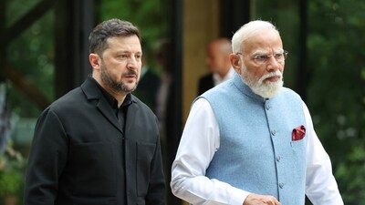 Ukraine's President Volodymyr Zelenskyi and India's Prime Minister Narendra Modi talk before a family photo photograph prior to a gala dinner as part of the G7 summit in Evian-les-Bains, France, June 16, 2026. (via REUTERS)