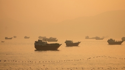 FILE PHOTO: Vessels at the Strait of Hormuz, as seen from Musandam, Oman. (REUTERS/Stringer/File Photo)