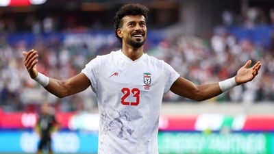 Ramin Rezaeian showed sharp instincts inside the box, reacting first after an initial effort was blocked and scrambling the ball past the advancing goalkeeper to bring Iran back on level terms. (REUTERS)