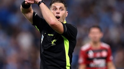 FIFA has cleared Shaun Evans of any code of conduct breach. (X images)