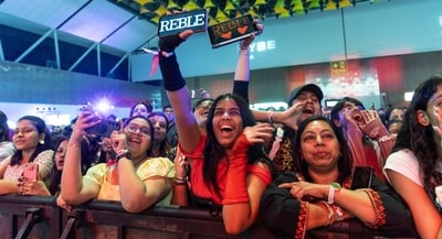 Fans cheering for performers at the event