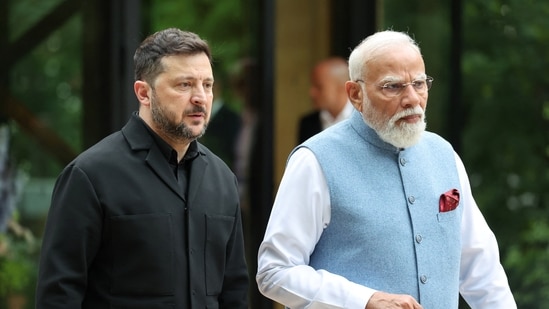 Ukraine's President Volodymyr Zelenskyi and India's Prime Minister Narendra Modi talk before a family photo photograph prior to a gala dinner as part of the G7 summit in Evian-les-Bains, France, June 16, 2026.(via REUTERS)