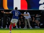 France's Kylian Mbappe (10) celebrates after scoring their third goal during their World Cup match against Senegal on June 16. (AP)