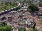 Over the last weekend, the Mumbai Rail Vikas Corporation (MRVC) demolished around 350 of 786 illegal shanties in Thane’s Bhola Nagar, which were obstructing the alignment of the proposed Airoli-Kalwa Elevated Corridor. (Praful Gangurde/HT Photo)