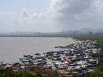 Fishing boats lie anchored along the Arabian sea coast near Mumbai.