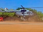  An Indian Air Force Mi-17 helicopter takes part in a mock drill ahead of the transportation of NEET-UG 2026 question paper
