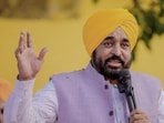 Punjab CM Bhagwant Mann speaks during a public meeting at Bhatalan village of Tanda constituency, Hoshiarpur district, on Wednesday. (@AAPPunjab)