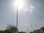 The Tricolour removed from the flagpole after severe storms hit Delhi. (Hindustan Times)