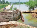 The damaged wall of the distributary near Kutba village, Raikot, in Ludhiana on Wednesday. (Gurpreet Singh/HT)