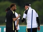 Brazil's forward #10 Neymar (L) speaks with Brazil's Italian head coach Carlo Ancelotti during an MD-1 training session at Columbia Park Training Facility in Morristown