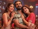 Shruti Haasan, Ram Charan, and Janhvi Kapoor in a still from the song Hellallallo from Peddi.