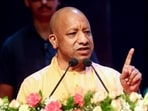 Uttar Pradesh chief minister Yogi Adityanath at an event in Lucknow on Wednesday. (ANI PHOTO)