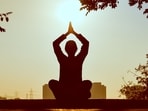 A representative image of a woman practising yoga.