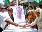 Congress party workers cut a cake to celebrate the 56th birthday of Lok Sabha LoP and Congress leader Rahul Gandhi, in Bhopal on Friday. 