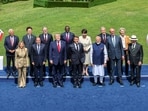 From left, European Council President Antonio Costa, Italian Prime Minister Giorgia Meloni, South Korea's President Lee Jae Myung, Egyptian President Abdel-Fattah el Sissi, British Prime Minister Keir Starmer, U.S. President Donald Trump, Kenya's President William Ruto, French President Emmanuel Macron Japan's Prime Minister Sanae Takaichi, India's Prime Minister Narenda Modi, Canadian Prime Minister Mark Carney, German Chancellor Friedrich Merz, European Commission President Ursula von der Leyen and Brazil's President Luiz Inacio Lula da Silva pose during a group photo of G7 leaders and invited nations during the G7 summit in Evian-les-Bains, France, Tuesday, June 16, 2026. AP/PTI(AP06_17_2026_000017B)