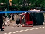 Police investigate the scene after a Central Park carriage horse bolted away from its driver killing a teenager from India on Wednesday, June 17, 2026 in New York. 