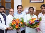 Karnataka Legislative Assembly LoP R Ashoka and state BJP president B Y Vijayendra congratulate party elected candidates Lingaraj Patil and Raghu R, who emerged victorious in the Legislative Council seats that went to polls. 