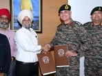 VC Karamjeet Singh and Brigadier Digvijay Singh, commandant of the Sikh Regimental Centre in Ramgarh Cantonment, Jharkhand, after signing the MoU in Amritsar. (HT)