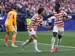 Christian Pulisic and Folarin Balogun celebrate during a 4-1 victory over Paraguay.