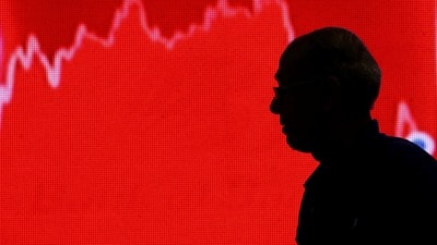 FILE PHOTO: FILE PHOTO: A man looks at a screen displaying news of markets update inside the Bombay Stock Exchange building in Mumbai, India, February 11, 2016. REUTERS/Danish Siddiqui/File Photo/File Photo (REUTERS)
