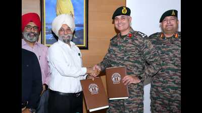 VC Karamjeet Singh and Brigadier Digvijay Singh, commandant of the Sikh Regimental Centre in Ramgarh Cantonment, Jharkhand, after signing the MoU in Amritsar. (HT) VC Karamjeet Singh and Brigadier Digvijay Singh, commandant of the Sikh Regimental Centre in Ramgarh Cantonment, Jharkhand, after signing the MoU in Amritsar. (HT)