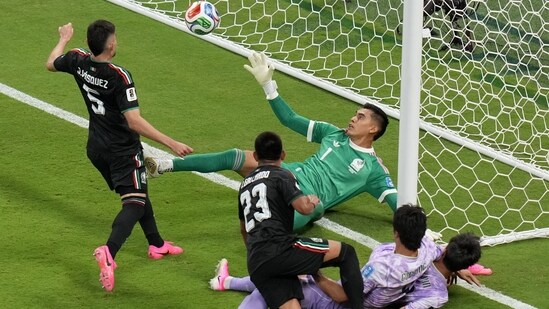 Mexico goalkeeper Raul Rangel comes up with a double save in second-half stoppage time.(AP Photo/Silvia Izquierdo)