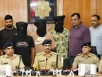 Acting on intelligence inputs, officials from the operations cell and crime branch laid a trap and nabbed the trio as they entered the city on a motorcycle. (HT Photo)