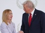 US President Donald Trump greets Italy's Prime Minister Giorgia Meloni during a summit on Gaza in Sharm el-Sheikh on October 13, 2025. Trump insists on June 20, 2026 Italian PM Meloni 'asked, over and over' for photo with him at G7.