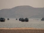 Vessels are anchored in the Strait of Hormuz, as seen from Musandam, Oman, June 19, 2026.