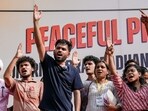 Cockroach Janta Party (CJP) founder Abhijeet Dipke, centre, during a protest over alleged examination irregularities, repeated paper leaks and demands for accountability from the government, in New Delhi.