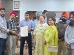 The delegation with the deputy commissioner in Ludhiana on Friday. (HT Photo)