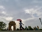 Tourists are seen at India Gate in New Delhi on Saturday. (Raj K Raj/HT PHOTO) Tourists are seen at India Gate in New Delhi on Saturday. (Raj K Raj/HT PHOTO)