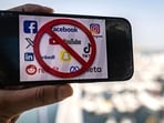 The logos of social media apps with a prohibition sign. The UAE announced a social media ban for children under 15 on June 18, joining a growing group of countries, including Australia, Britain and Canada, to take similar measures.