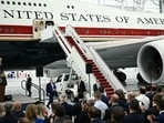 President Donald Trump and reporters received a first look inside the Boeing 747 gifted by Qatar that will serve as a temporary Air Force One.  (Photo by Brendan SMIALOWSKI / AFP)