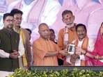 Chief minister Yogi Adityanath at a public event in Lalitpur on Saturday. (PTI PHOTO)
