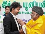 Tamil Nadu chief minister C Joseph Vijay felicitates Indian Union Muslim League (IUML) National President Professor KM Kader Mohideen during a meeting, at IUML office, in Chennai.