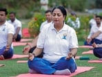 **EDS: THIRD PARTY IMAGE** In this image posted on June 21, 2026, Delhi Chief Minister Rekha Gupta performs yoga on the occasion of International Yoga Day, in New Delhi. (@BJP4Delhi/X via PTI Photo)
(PTI06_21_2026_000310B)(@BJP4Delhi)
