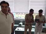 Police at the Meham office of Congress MLA Balram Dangi on Saturday morning. Four shots were fired at the office around 1am. No one was injured in the incident. (Manoj Dhaka/HT)