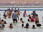 Residents beat the heat with a dip in Sangam waters in Prayagraj on Saturday. (Anil Kumar Maurya/HT) Residents beat the heat with a dip in Sangam waters in Prayagraj on Saturday. (Anil Kumar Maurya/HT)
