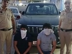 The victim suffered a shoulder injury and facial cuts from shattered glass. Police said a video he recorded helped identify the accused. The victim suffered a shoulder injury and facial cuts from shattered glass. Police said a video he recorded helped identify the accused.