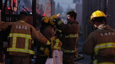 Fire crews stage outside a warehouse in the Boyle Heights section of Los Angeles on Wednesday, June 17, 2026. (AP Photo/Jae C. Hong) (AP Photo/Jae C. Hong) Fire crews stage outside a warehouse in the Boyle Heights section of Los Angeles on Wednesday, June 17, 2026. (AP Photo/Jae C. Hong) (AP Photo/Jae C. Hong)