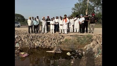 MP Malvinder Singh Kang inspecting a drainage area. (HT Photo)