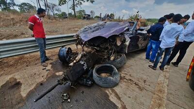 Thane, India - June -21, 2026: Two Killed in BMW Car Crash on MumbaiÐVadodara Highway Near Badlapur in thane District A tragic accident involving a BMW car took place on the MumbaiÐVadodara Highway near Eranjad, close to Badlapur, at around 2 a.m. on Saturday night.The occupants were travelling towards Badlapur from Titwala when the speeding driver reportedly lost control of the vehicle near Eranjad. The car, believed to have been travelling at an estimated speed of around 251 kmph, hit the road divider and overturned in the darkness, allegedly due to misjudging the road and speed. The impact was so severe that the vehicle was completely mangled. Two persons were killed in the accident. Police have launched an investigation into the incident and are conducting further inquiries ,in Thane ,in Mumbai, India, on, Sunday, June -21, 2026. ( photo by Praful Gangurde / Hindustan Times ) Thane, India - June -21, 2026: Two Killed in BMW Car Crash on MumbaiÐVadodara Highway Near Badlapur in thane District A tragic accident involving a BMW car took place on the MumbaiÐVadodara Highway near Eranjad, close to Badlapur, at around 2 a.m. on Saturday night.The occupants were travelling towards Badlapur from Titwala when the speeding driver reportedly lost control of the vehicle near Eranjad. The car, believed to have been travelling at an estimated speed of around 251 kmph, hit the road divider and overturned in the darkness, allegedly due to misjudging the road and speed. The impact was so severe that the vehicle was completely mangled. Two persons were killed in the accident. Police have launched an investigation into the incident and are conducting further inquiries ,in Thane ,in Mumbai, India, on, Sunday, June -21, 2026. ( photo by Praful Gangurde / Hindustan Times )