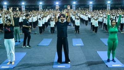Union Minister Anupriya Patel, Bollywood actor Shahid Kapoor, Maharashtra Chief Minister Devendra Fadnavis's wife Amruta Fadnavis perform yoga on the occasion of International Yoga Day, at Worli Dome, in Mumbai, Maharashtra. (PTI)