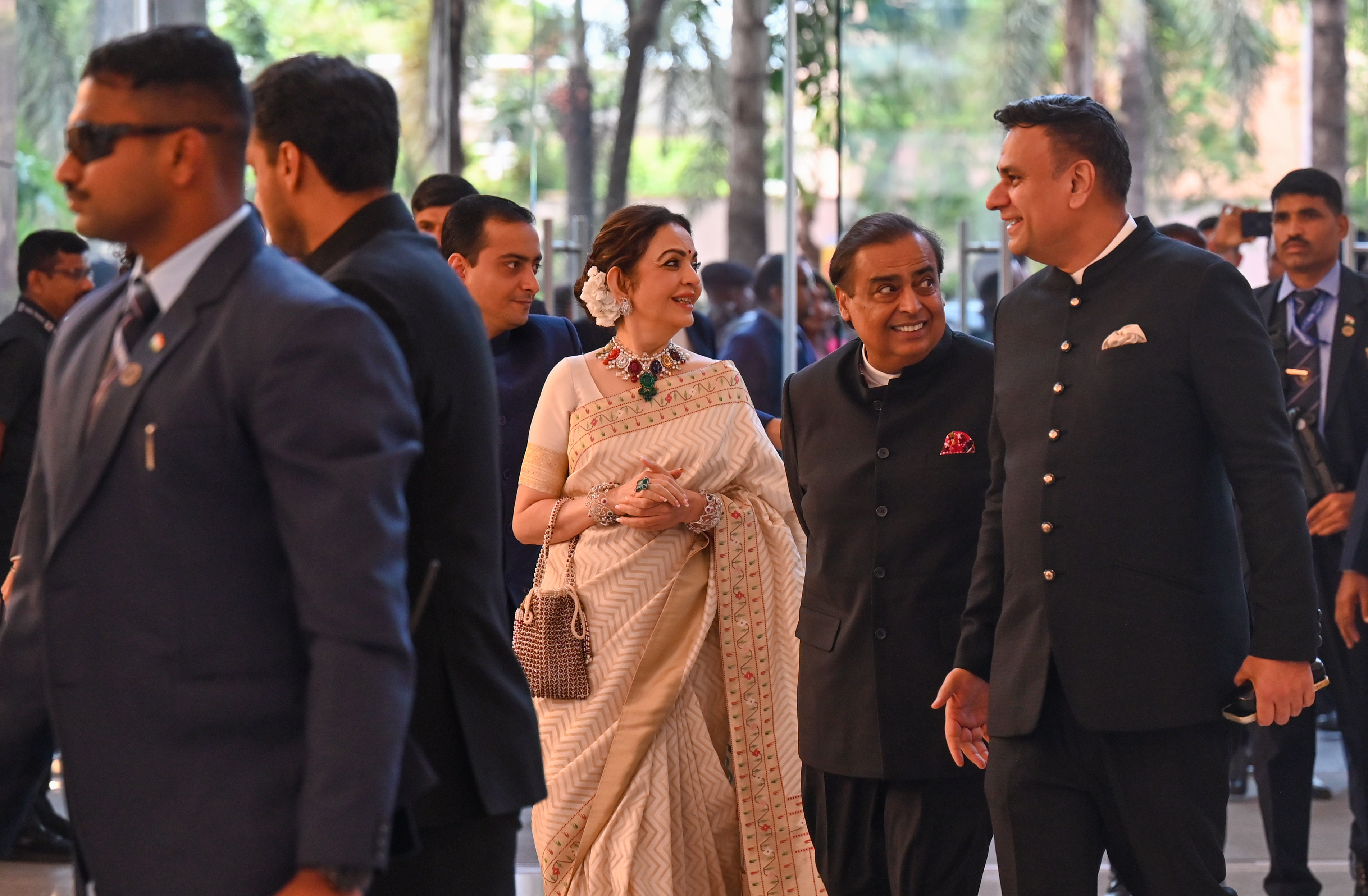 Mukesh Ambani and Nita Ambani (left) attended the wedding celebration of Ravati Sule, daughter of NPC leader Supriya Sule, at the Jio World Convention Centre in Mumbai on June 20, 2026. (HT Photo/ Raju Shinde)