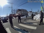 FILE - This photo taken from Hartford Police body camera video shows Steven Jones, right, as police officers shout commands to him seconds before he is shot by officer Joseph Magnano, center, Feb. 27, 2026 in Hartford, Conn. 