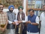 BJP national president Nitin Nabin along with Punjab unit president Kewal Singh Dhillon and other party leaders with agriculture economist SS Johl (centre) at his residence in Ludhiana on Monday. (Gurpreet Singh/HT)