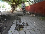 Bad condition cycle track at Sector 19 in Chandigarh on Monday. (Keshav Singh/HT)